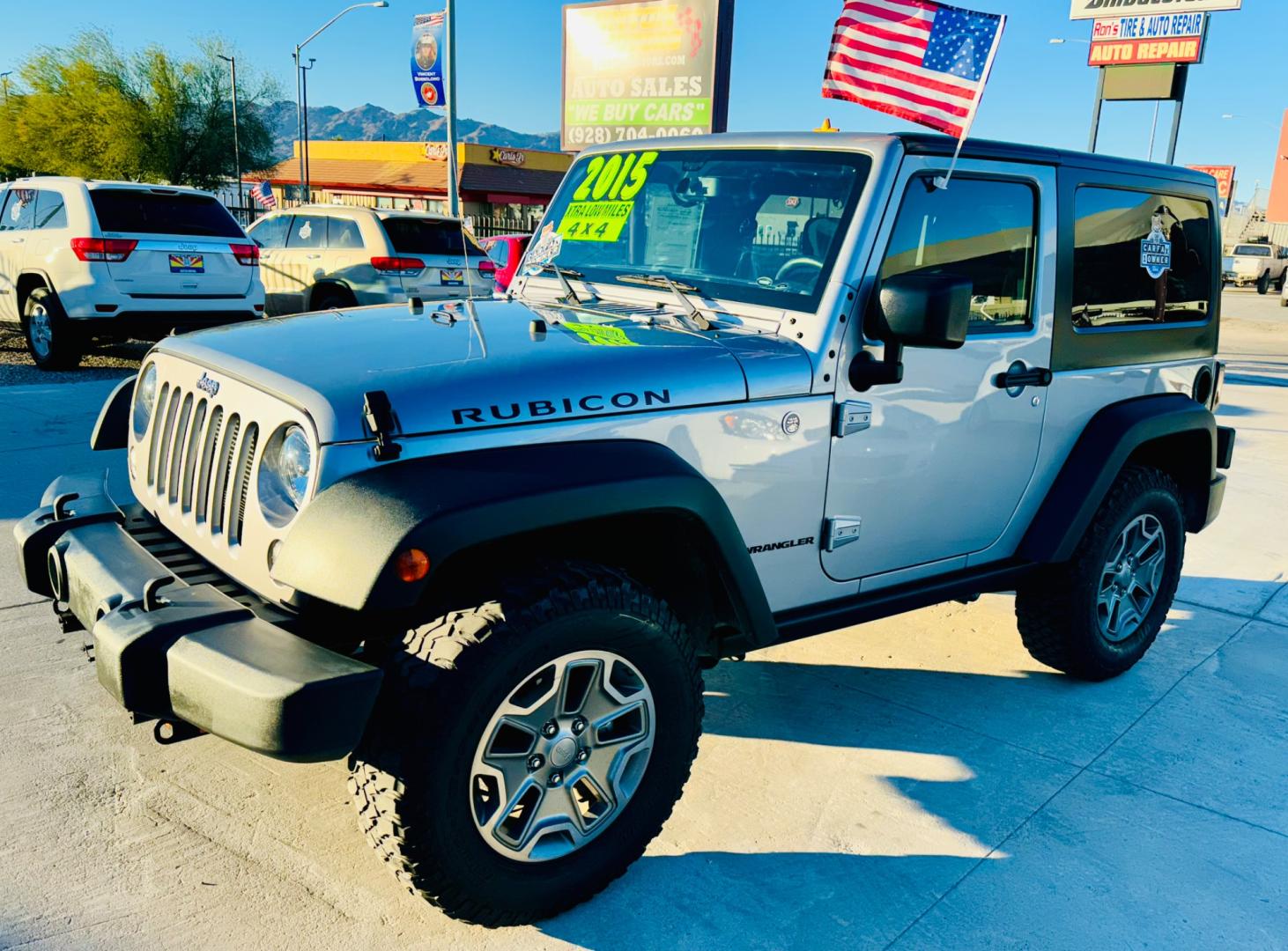 2015 Silver /black Jeep Wrangler (1C4BJWCG3FL) , located at 2190 Hwy 95, Bullhead City, AZ, 86442, (928) 704-0060, 0.000000, 0.000000 - 2015 Jeep wrangler Rubicon. automatic hard top. only 15545 miles. *1 owner. super super clean. always garaged. local jeep. free and clear title. has brackets in front to tow behind. - Photo#0